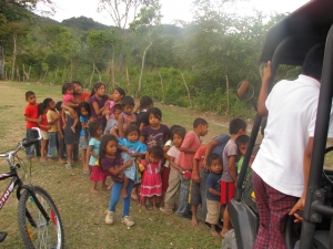 Chorti Mayan Chidren line up for volunteer school supply delivery, Honduras - Paramedics for Children